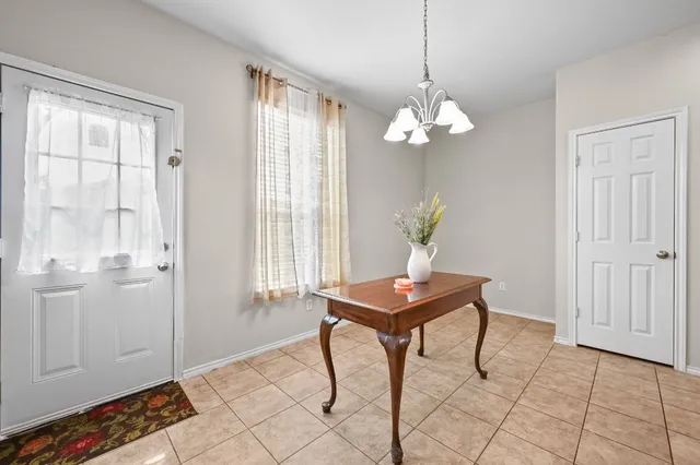 a view of room with furniture and a window