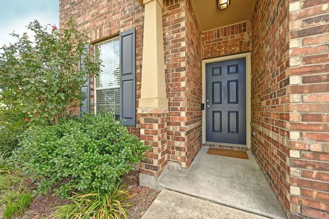 a view of a bedroom with closet area