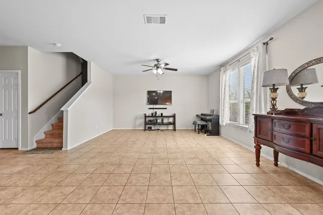 a kitchen with stainless steel appliances granite countertop a stove and a sink with cabinets