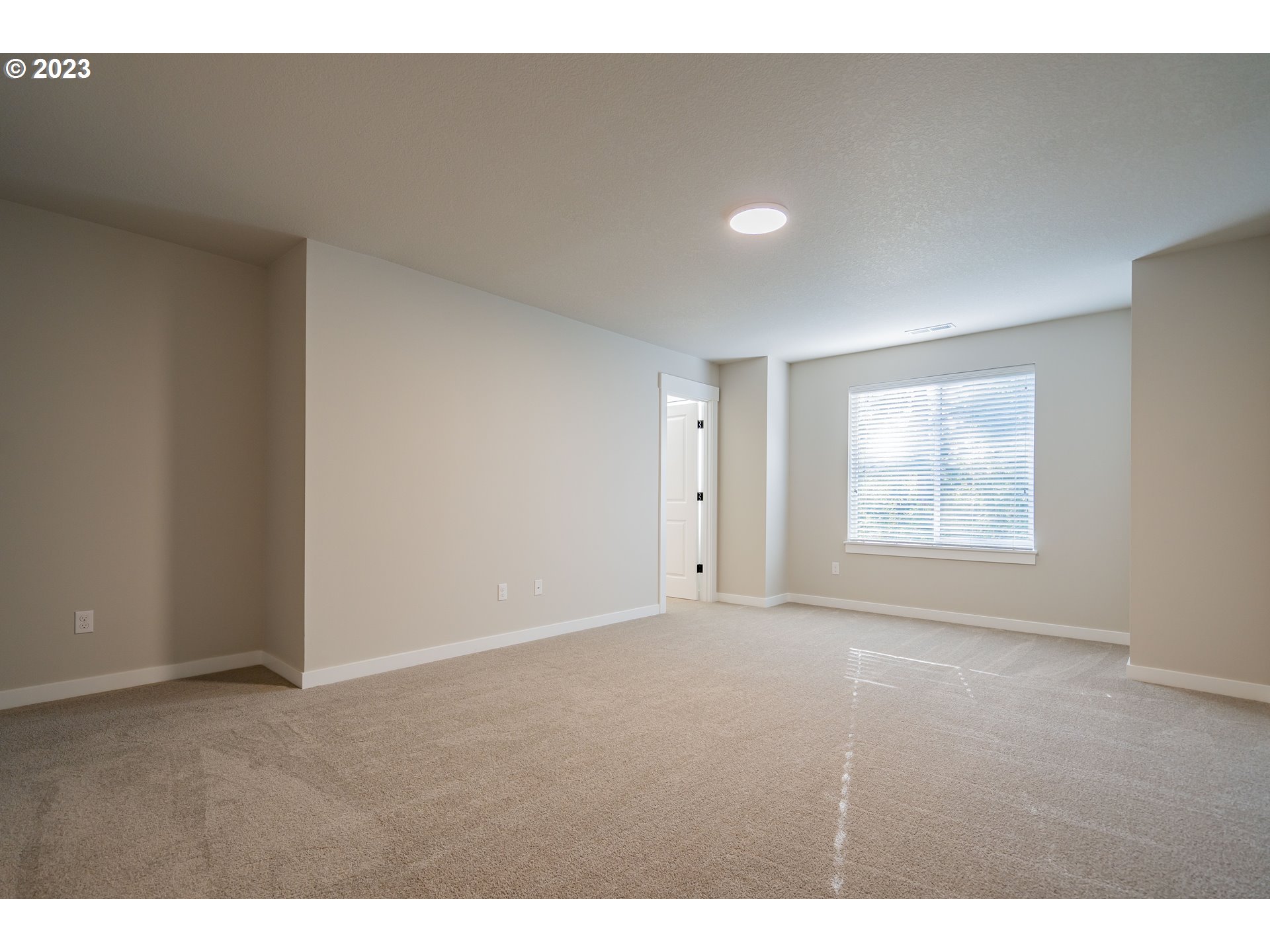 7017 South 13th Street Ridgefield, WA 98642 - Photo 13 of 33 a view of an empty room with a window