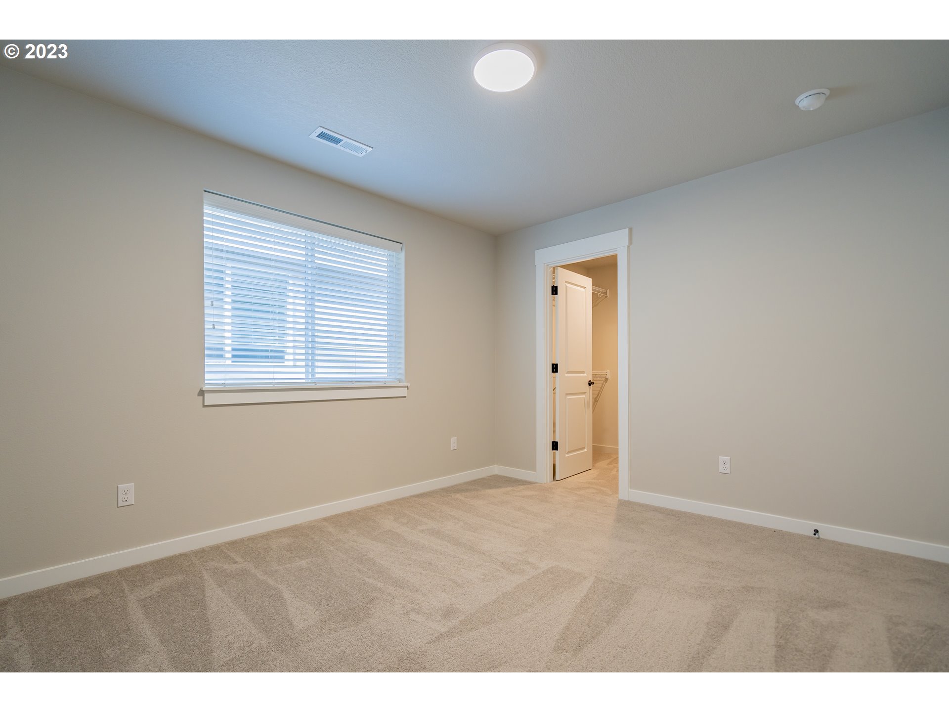 7017 South 13th Street Ridgefield, WA 98642 - Photo 24 of 33 a view of an empty room with a window