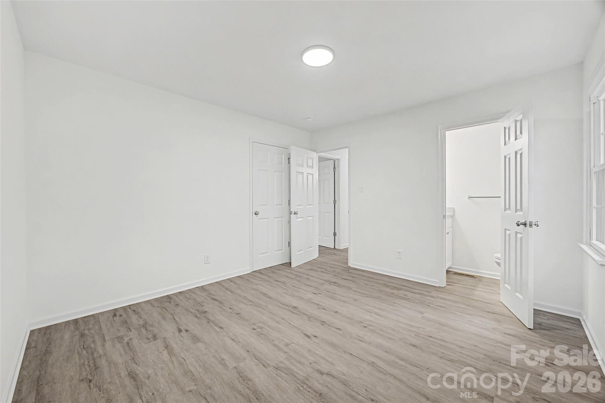 1135 Princeton Road Rock Hill, SC 29730 - Photo 12 of 20 a view of an empty room with wooden floor