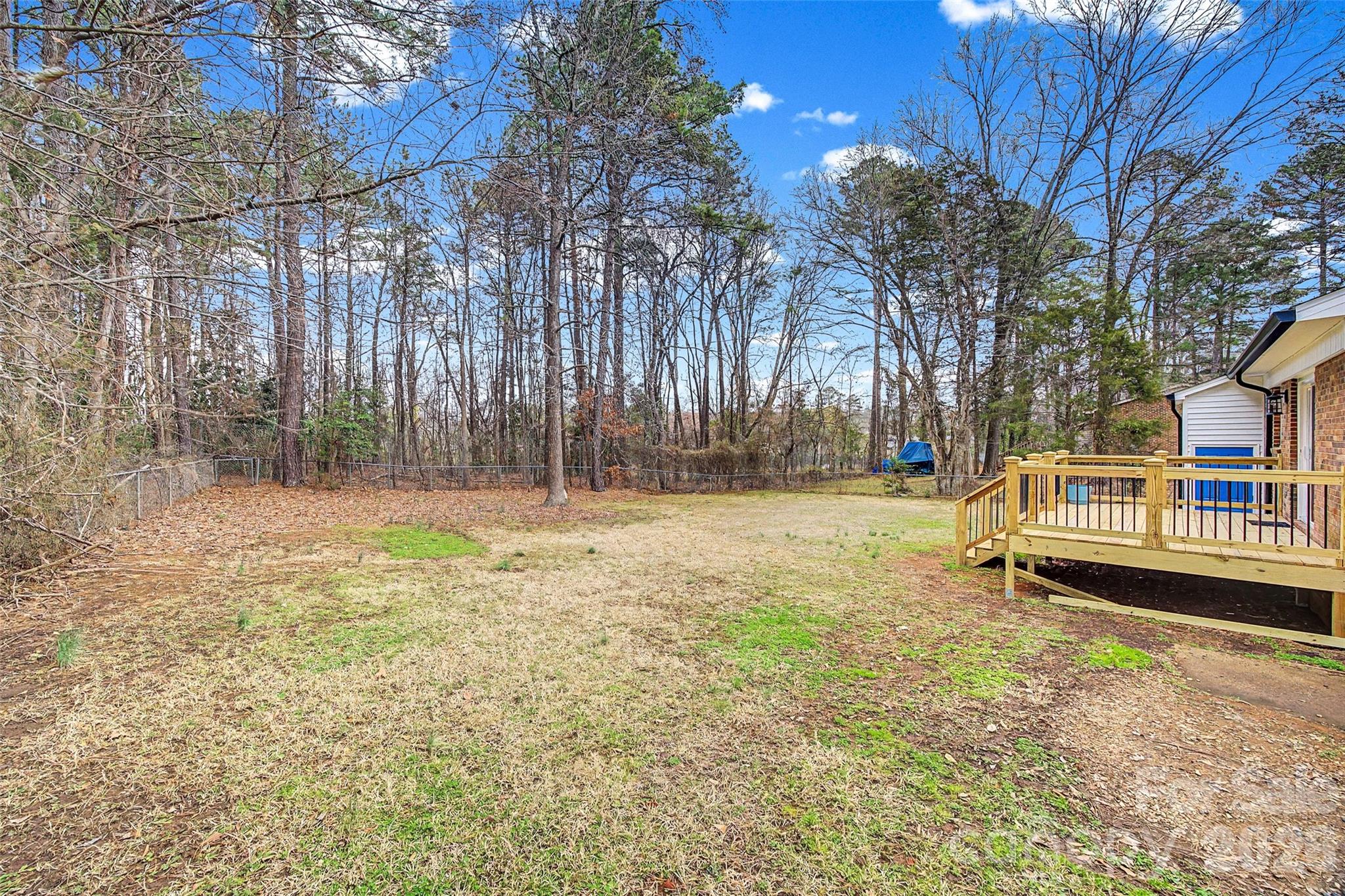 1135 Princeton Road Rock Hill, SC 29730 - Photo 17 of 20 a backyard of a house with trees and outdoor seating