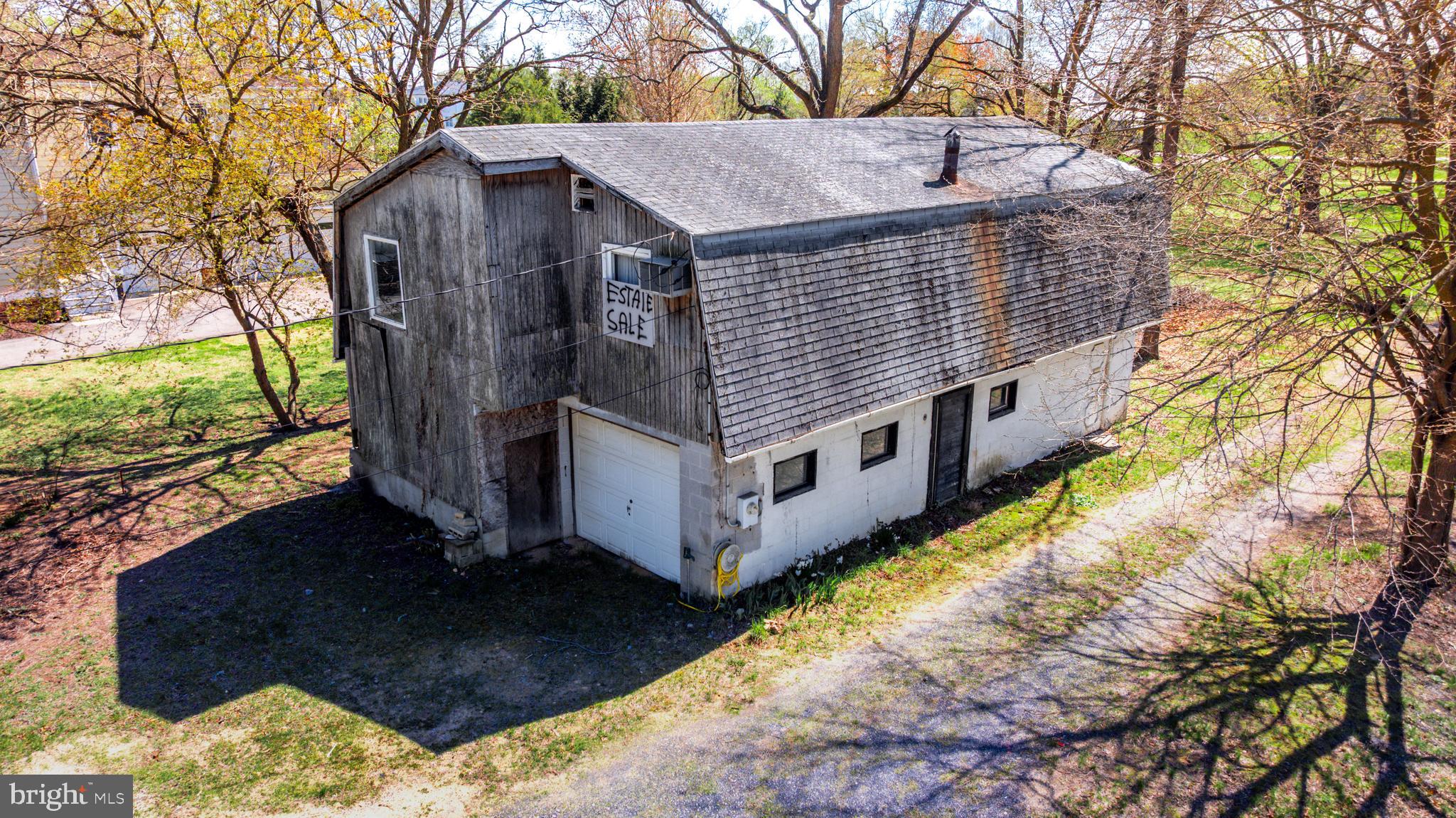 1003 Bowleys Quarters Road Baltimore, MD 21220 - Photo 45 of 96 a view of a house with a yard