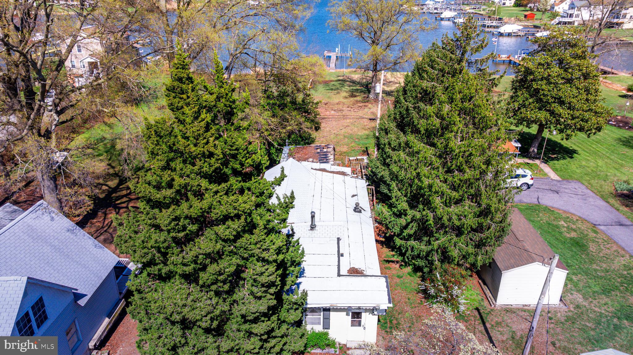 1003 Bowleys Quarters Road Baltimore, MD 21220 - Photo 53 of 96 an aerial view of a house with a yard and garden