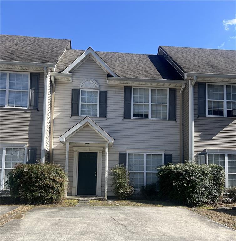 93 Dodd Boulevard Southeast Rome, GA 30161 - Photo 2 of 2 a front view of a house with yard