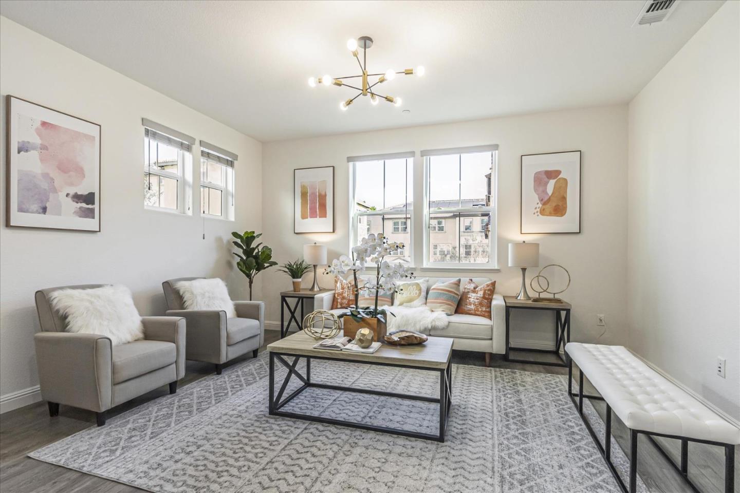 a living room with furniture and windows