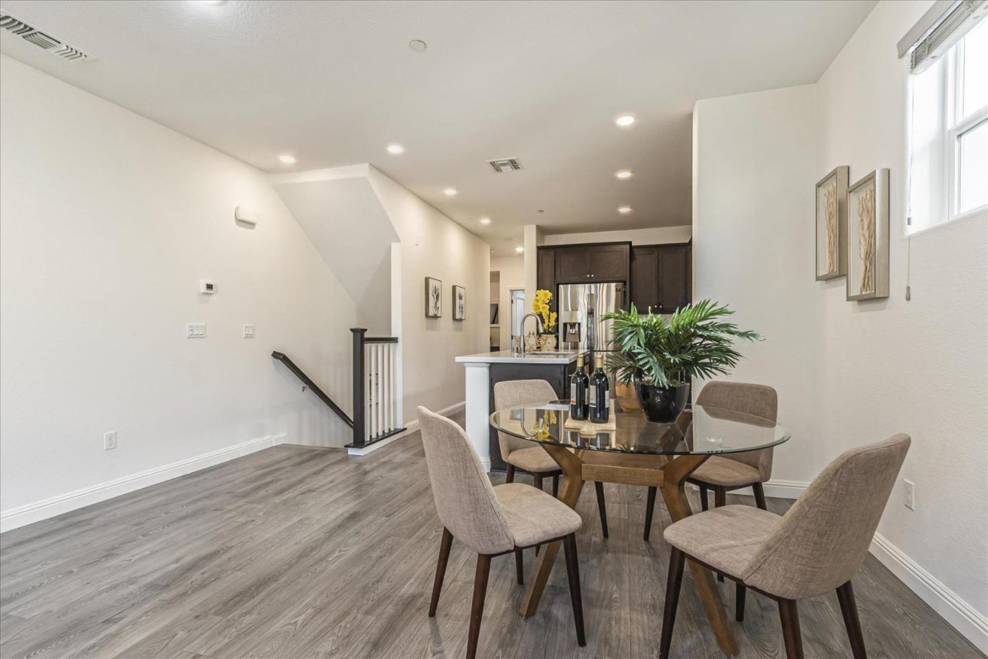 37366 Sequoia Road Fremont, CA 94536 - Photo 11 of 32 a dining room with furniture and wooden floor