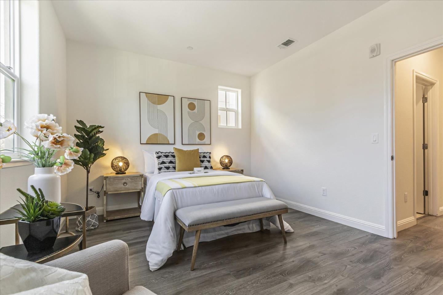 37366 Sequoia Road Fremont, CA 94536 - Photo 15 of 32 a bedroom with a bed and a potted plant
