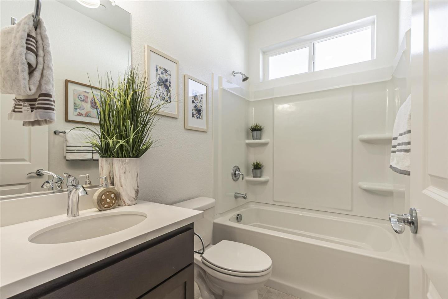37366 Sequoia Road Fremont, CA 94536 - Photo 19 of 32 a bathroom with a sink a toilet and shower