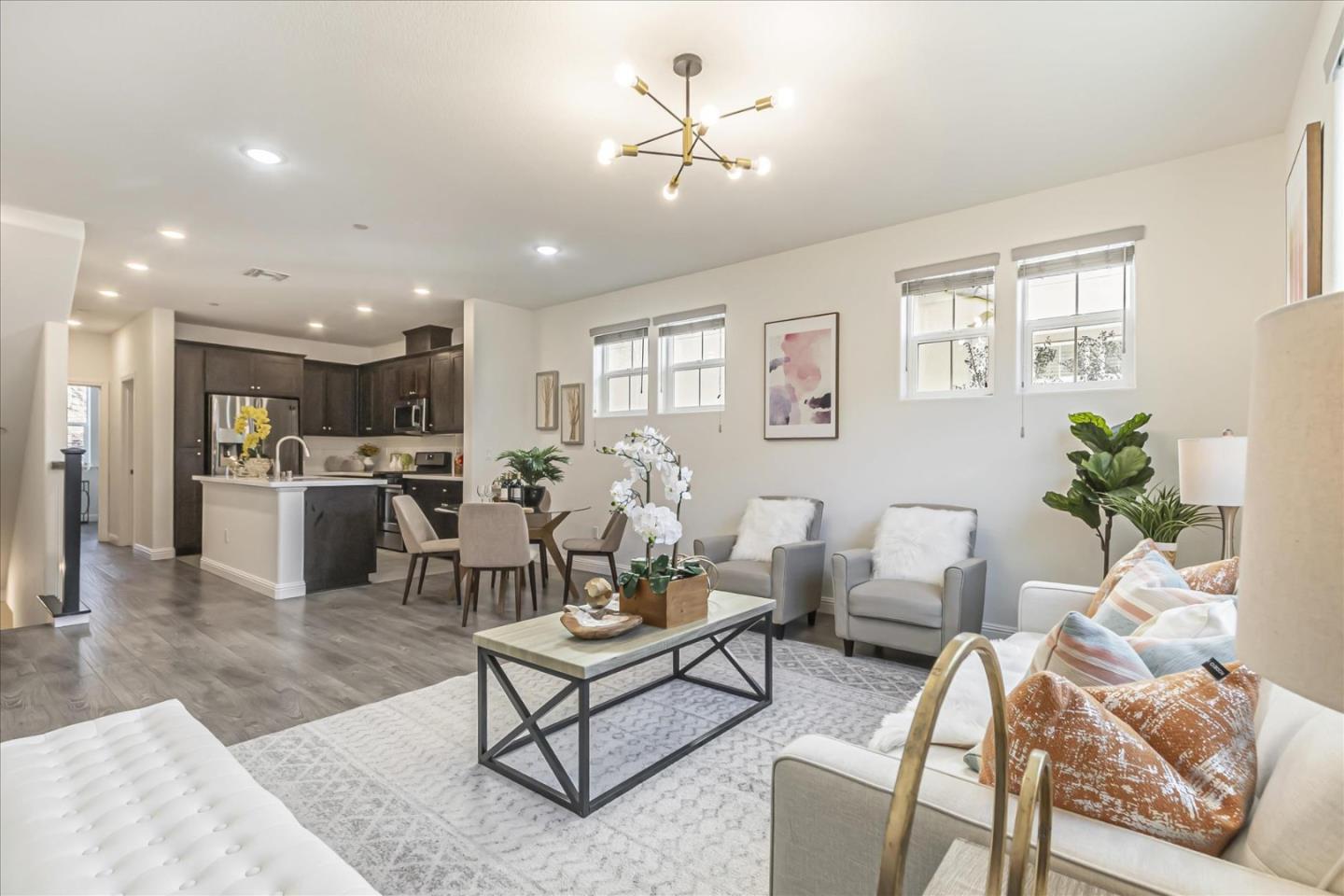 37366 Sequoia Road Fremont, CA 94536 - Photo 4 of 32 a living room with furniture kitchen view and a potted plant