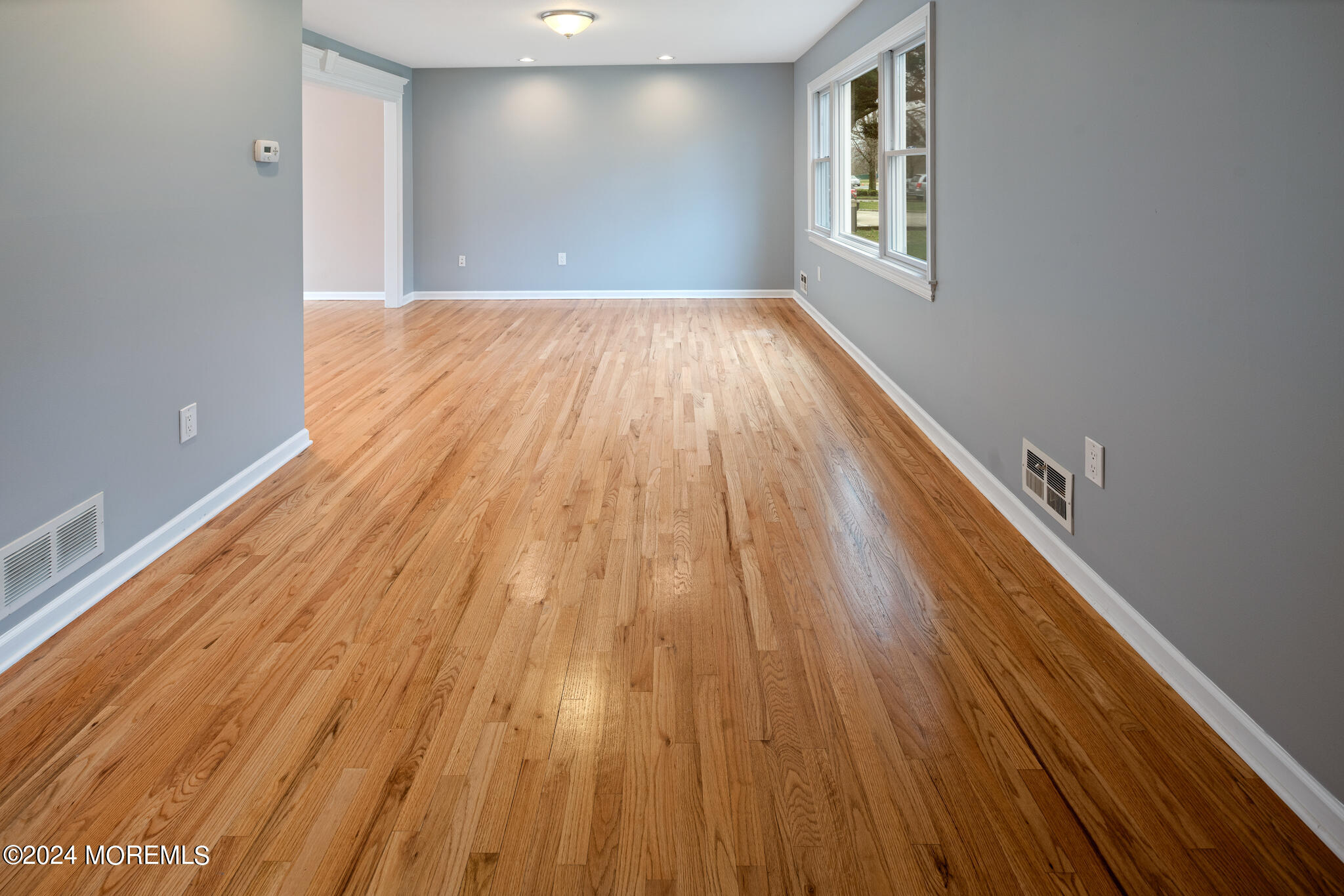 362 Elton Adelphia Road Freehold, NJ 07728 - Photo 13 of 38 wooden floor in a hall with an entryway