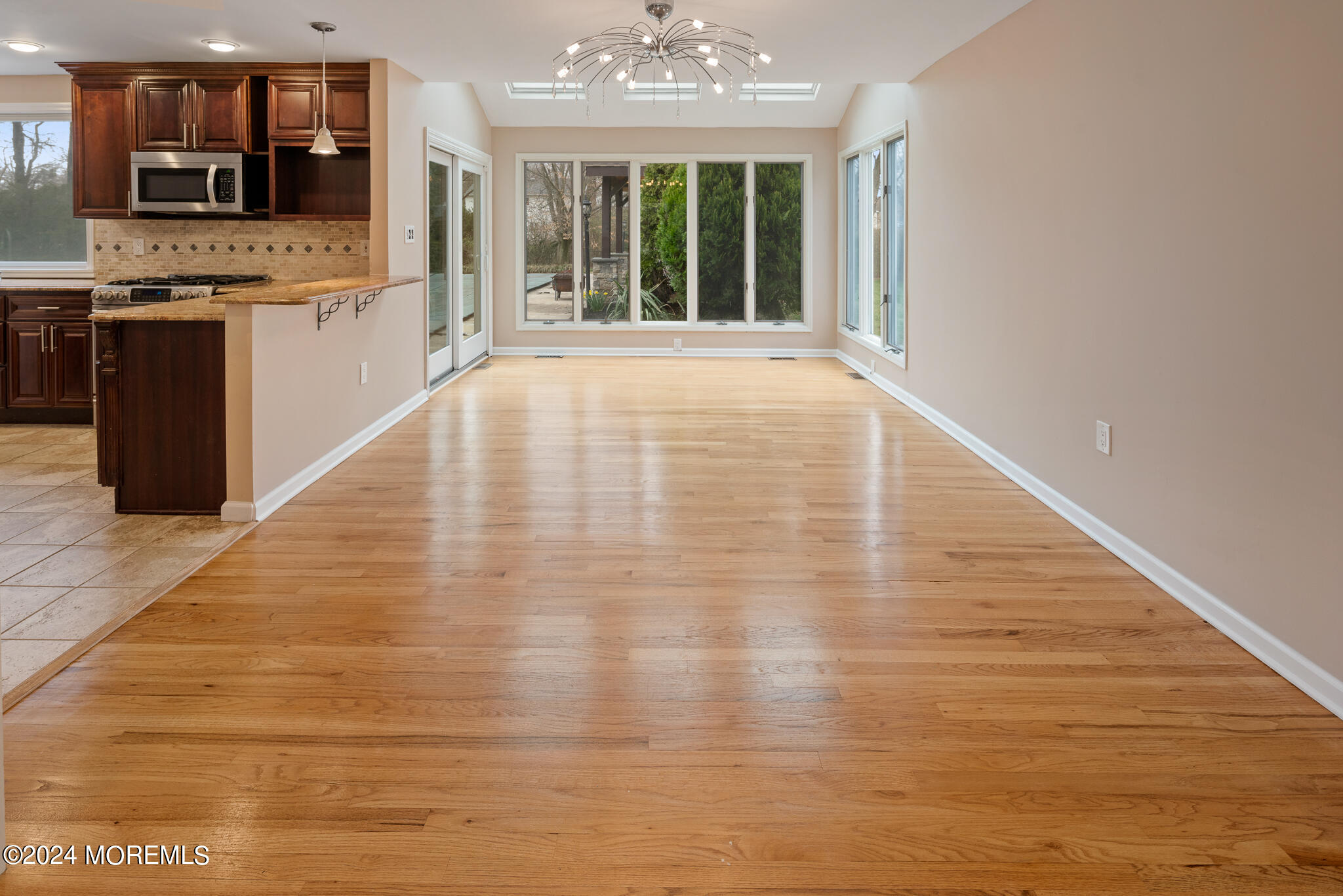 362 Elton Adelphia Road Freehold, NJ 07728 - Photo 14 of 38 a view of an empty room with a kitchen