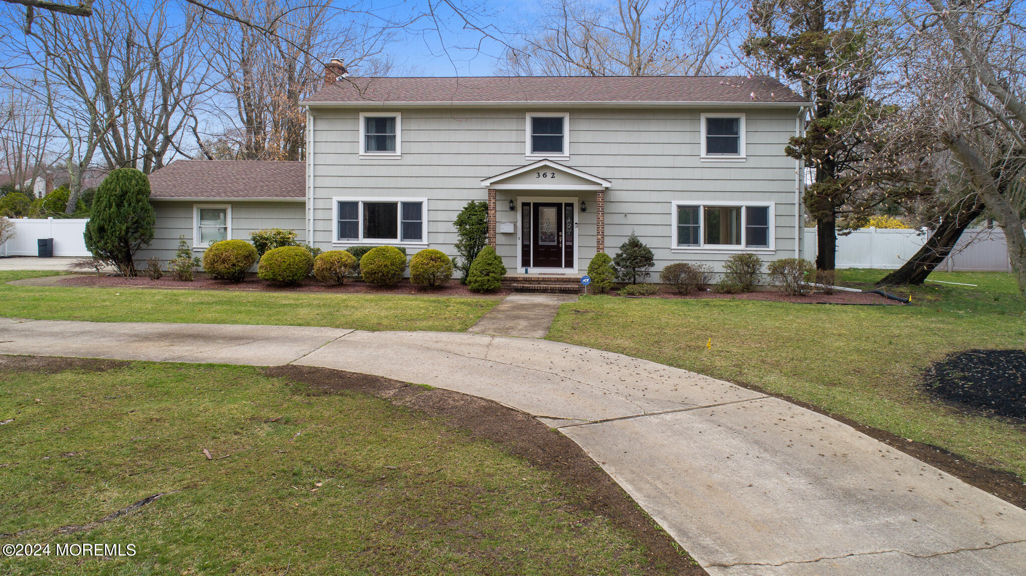 362 Elton Adelphia Road Freehold, NJ 07728 - Photo 2 of 38 a front view of a house with a garden