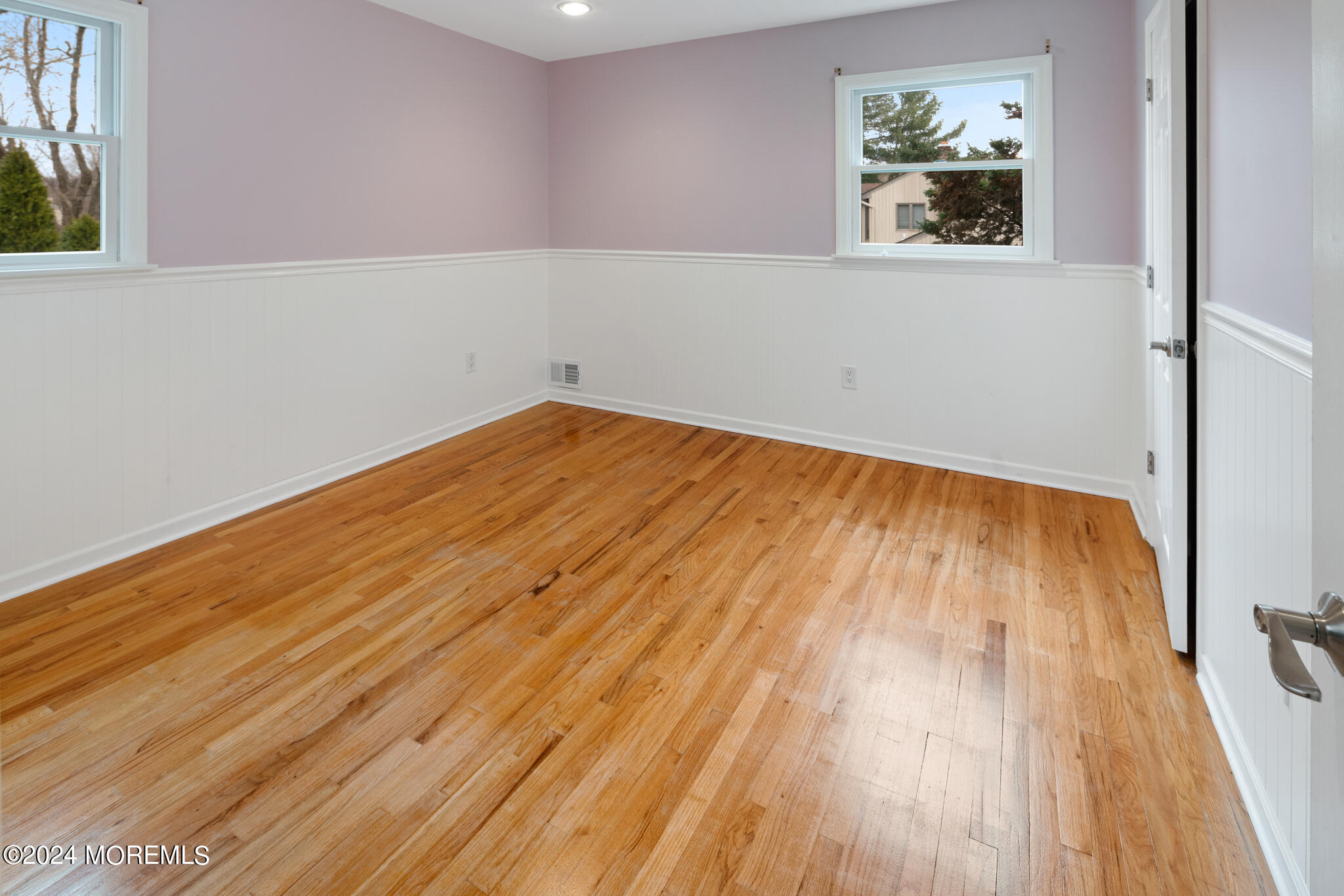 362 Elton Adelphia Road Freehold, NJ 07728 - Photo 24 of 38 a view of empty room with wooden floor and fan