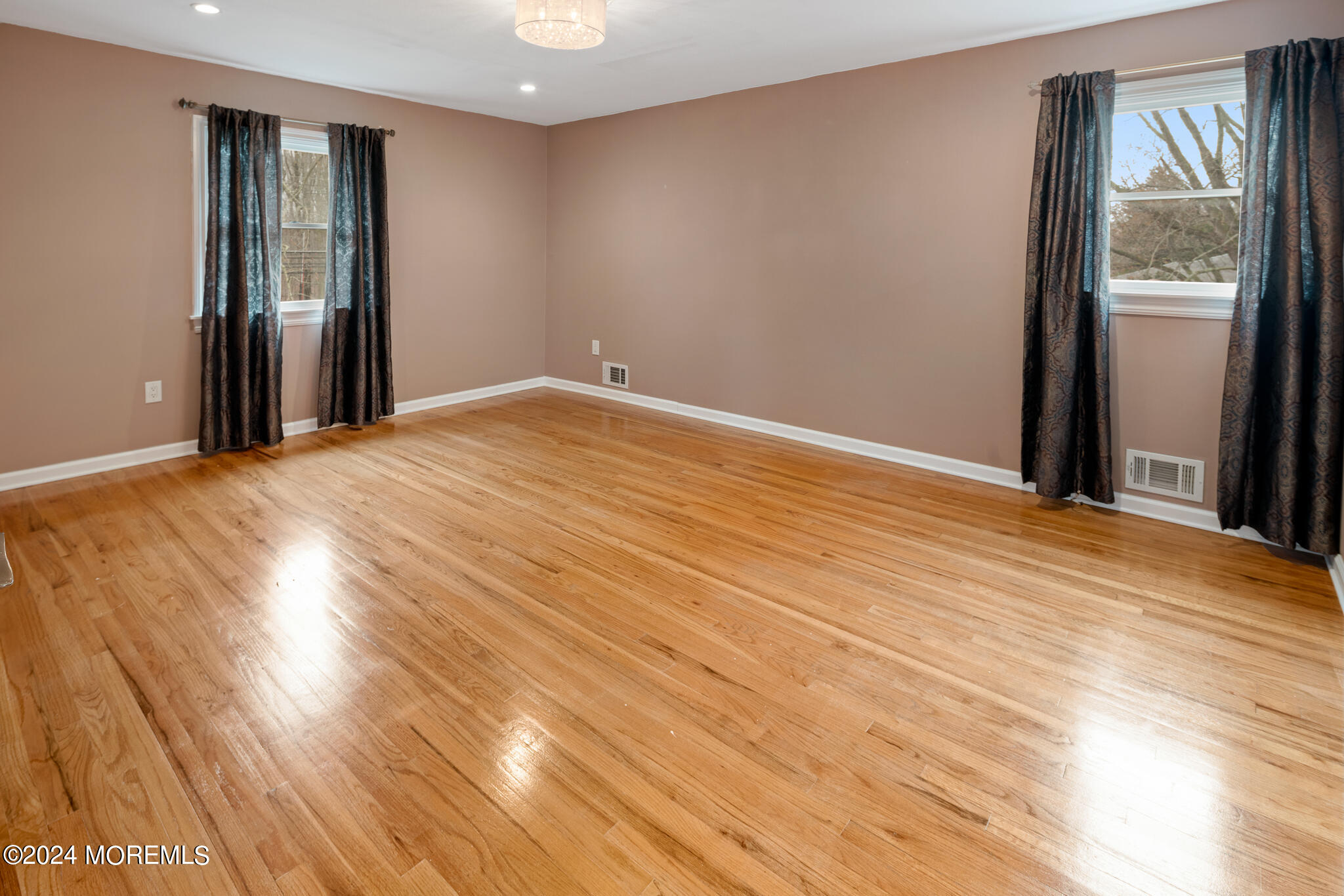 362 Elton Adelphia Road Freehold, NJ 07728 - Photo 27 of 38 a view of empty room with wooden floor