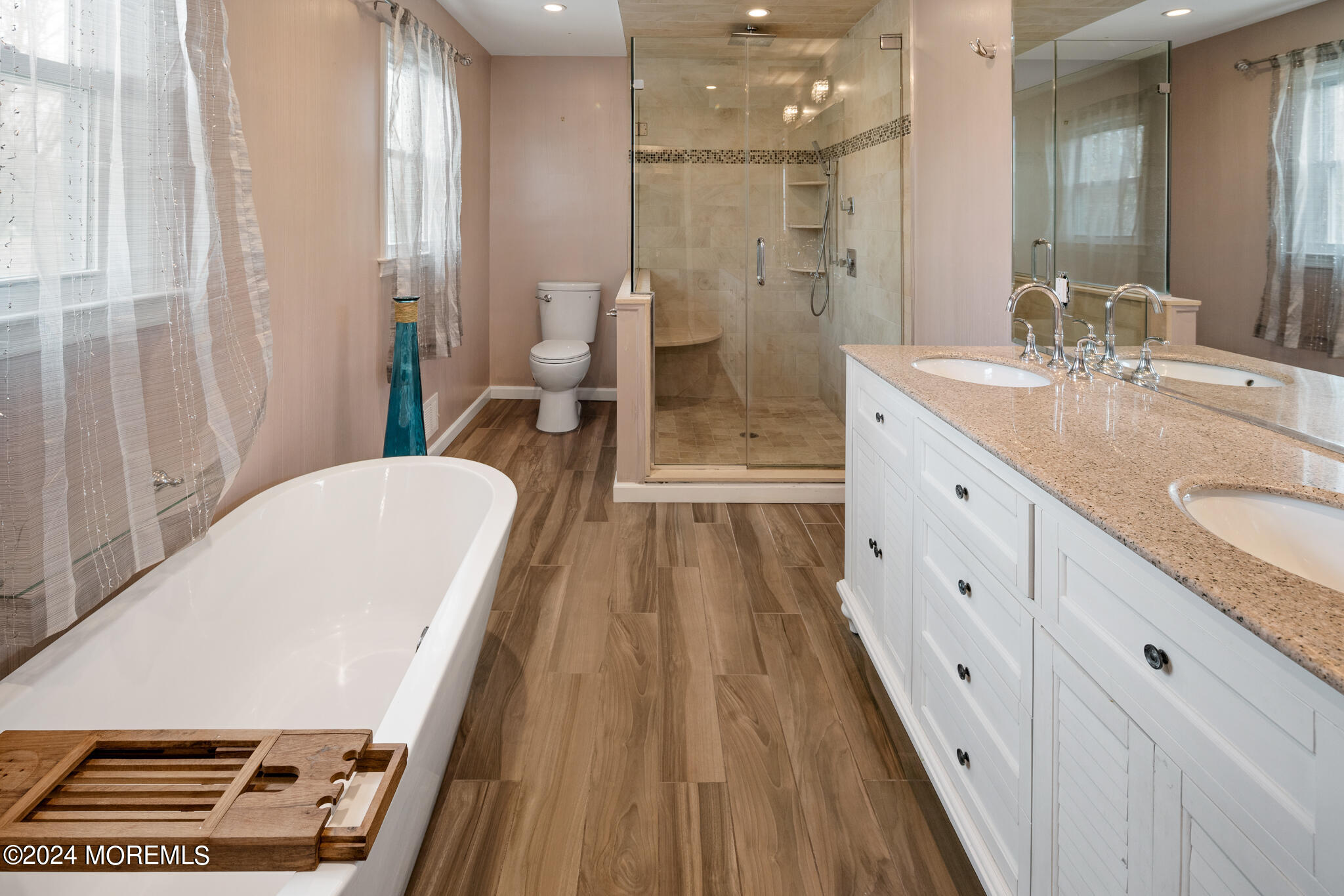 362 Elton Adelphia Road Freehold, NJ 07728 - Photo 30 of 38 a spacious bathroom with a granite countertop sink a toilet a mirror and shower