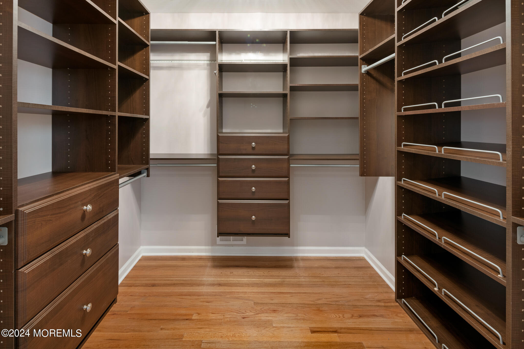 362 Elton Adelphia Road Freehold, NJ 07728 - Photo 31 of 38 a view of walk in closet with clothes and shoes