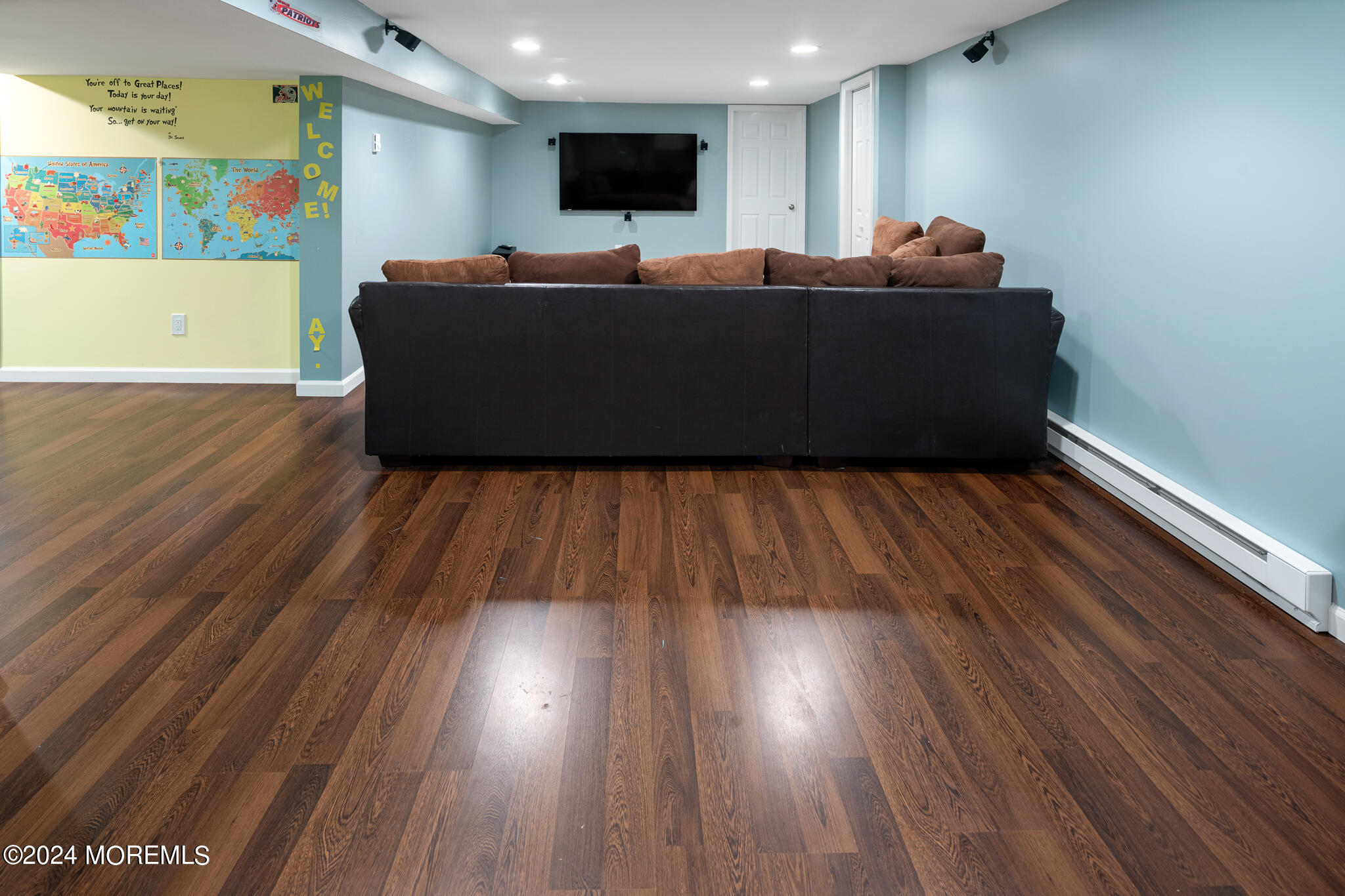 362 Elton Adelphia Road Freehold, NJ 07728 - Photo 33 of 38 a living room with hard wood flooring and a couch