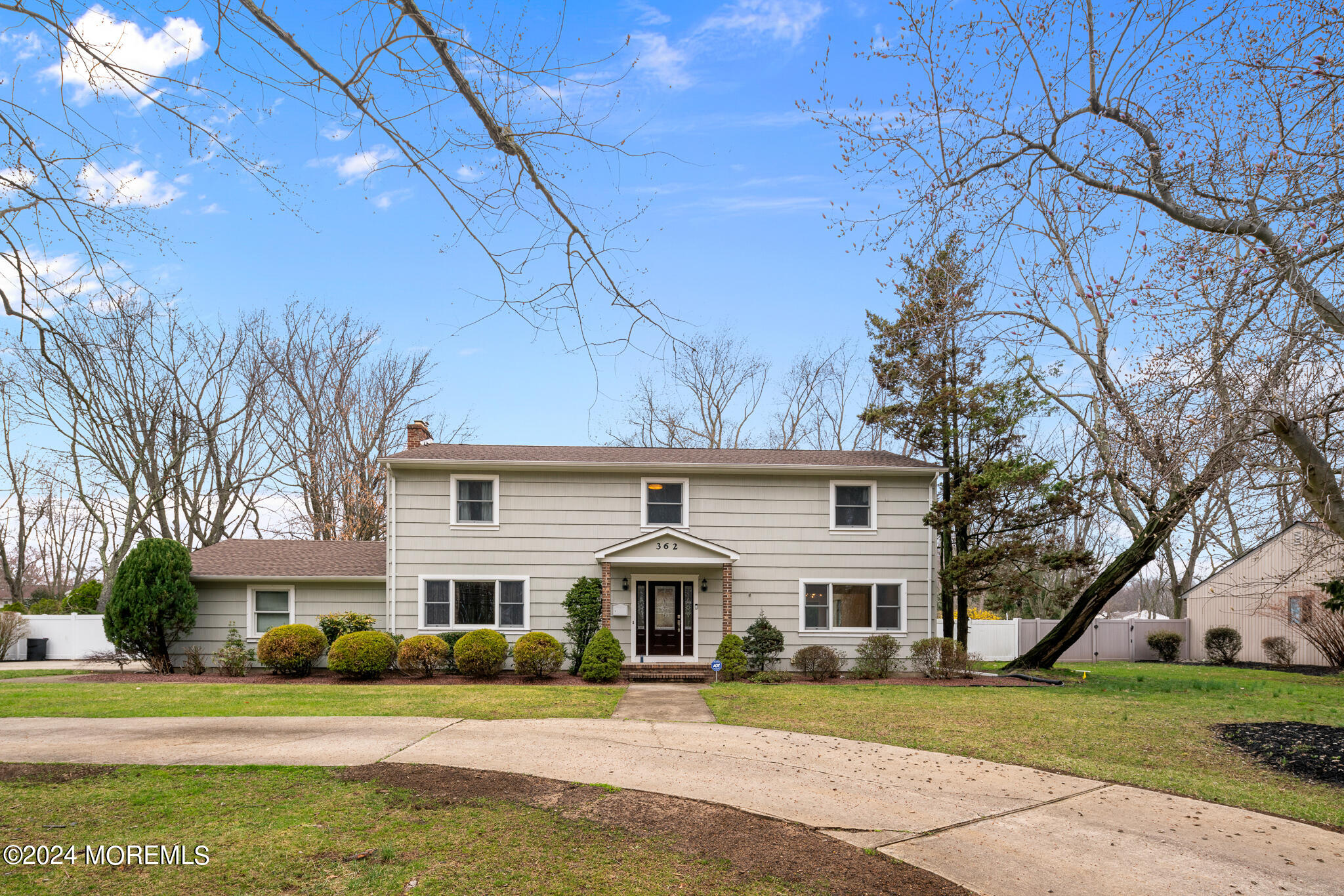 362 Elton Adelphia Road Freehold, NJ 07728 - Photo 7 of 38 a front view of a house with a yard