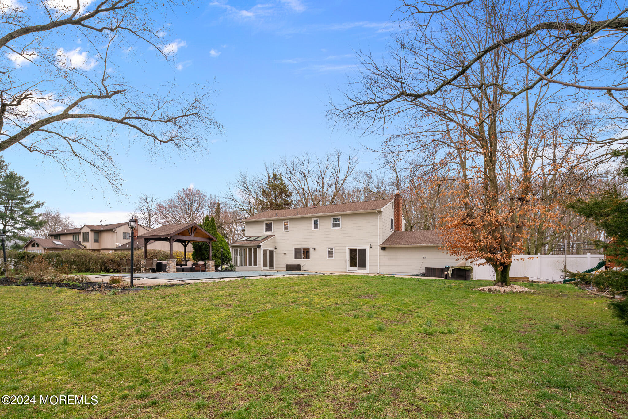 362 Elton Adelphia Road Freehold, NJ 07728 - Photo 9 of 38 a house view with swimming pool in front of it