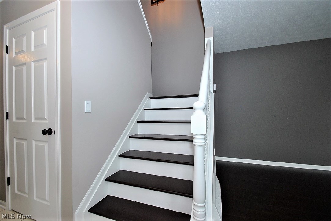 4380 Archer Road Cleveland, OH 44105 - Photo 9 of 16 Split stairway to upper level.