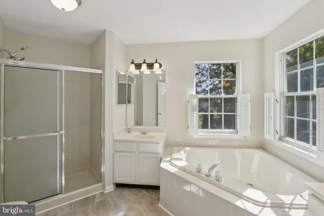 a view of a livingroom with wooden floor