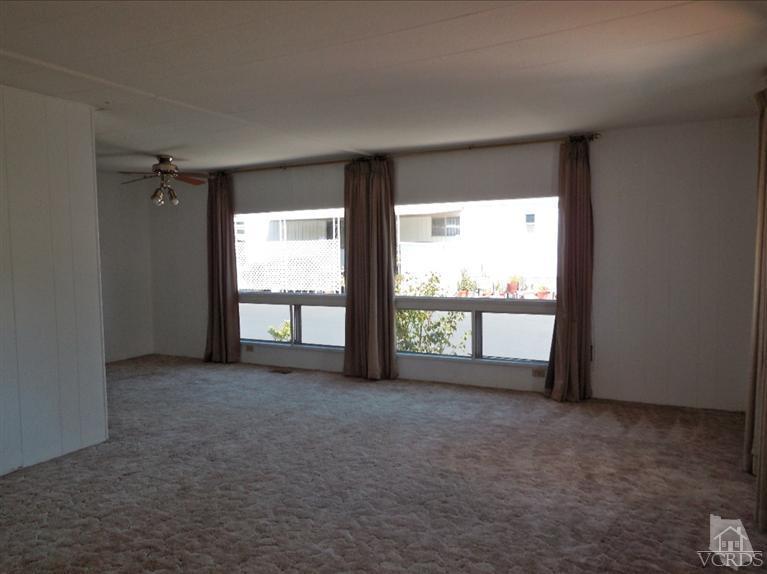 1225 South Rice Road, Unit 44 Ojai, CA 93023 - Photo 3 of 5 an empty room with windows