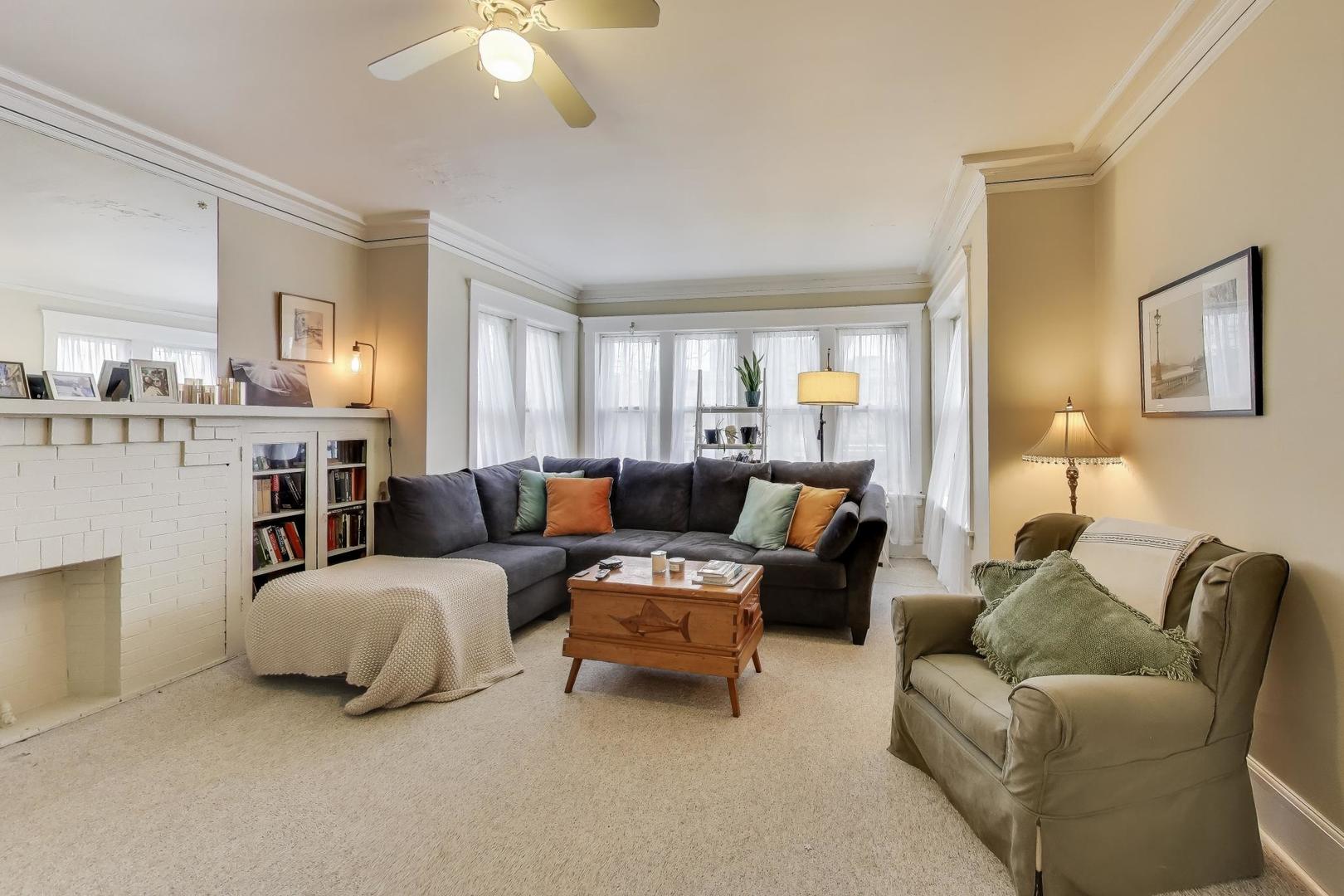 2245 West Giddings Street Chicago, IL 60625 - Photo 18 of 50 a living room with furniture and a large window