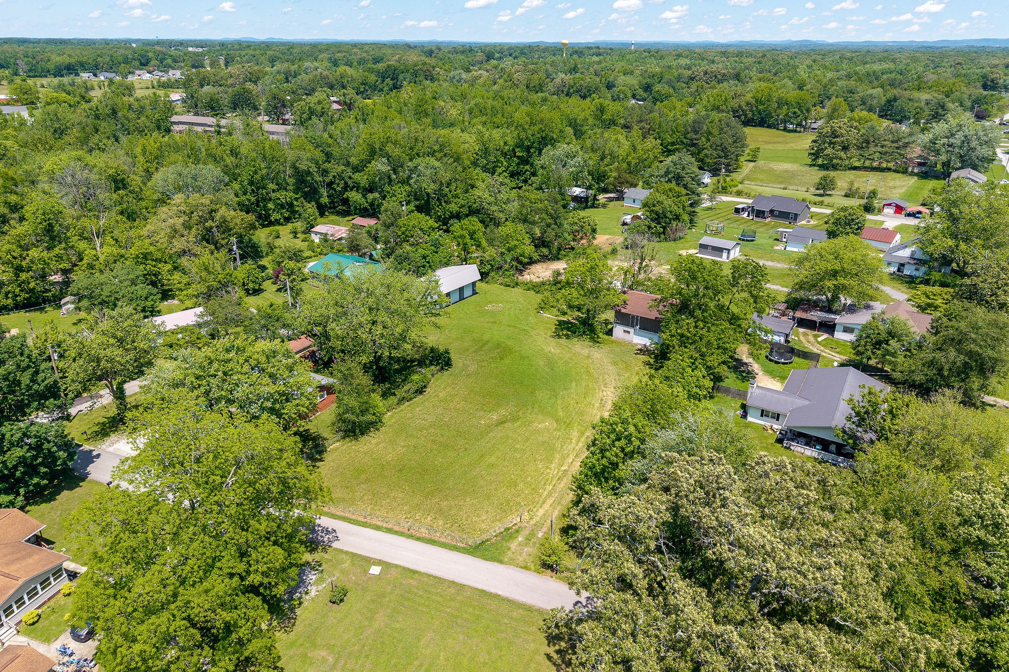 214 5th Avenue South Baxter, TN 38544 - Photo 13 of 20 a view of a lake with a house