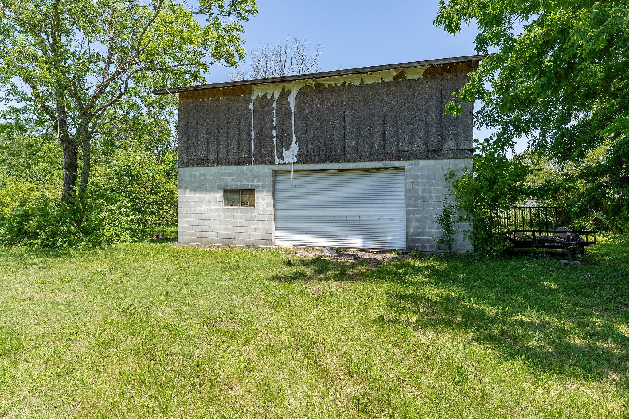 214 5th Avenue South Baxter, TN 38544 - Photo 15 of 20 a backyard of a house with lots of green space