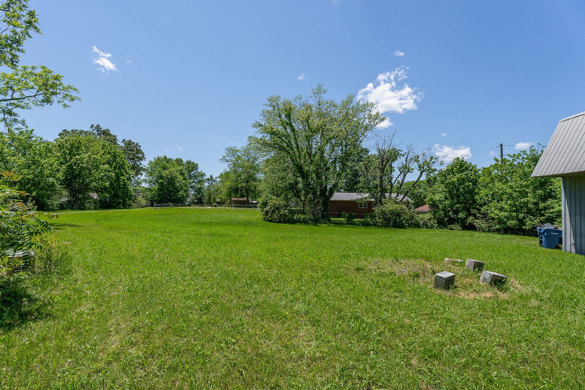 214 5th Avenue South Baxter, TN 38544 - Photo 18 of 20 a view of a house with a big yard