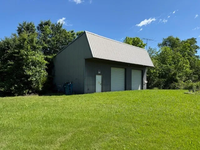 a front view of a house with yard