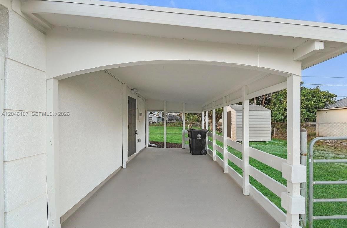 981 Southwest Bay State Road Port St. Lucie, FL 34953 - Photo 6 of 17 Carport