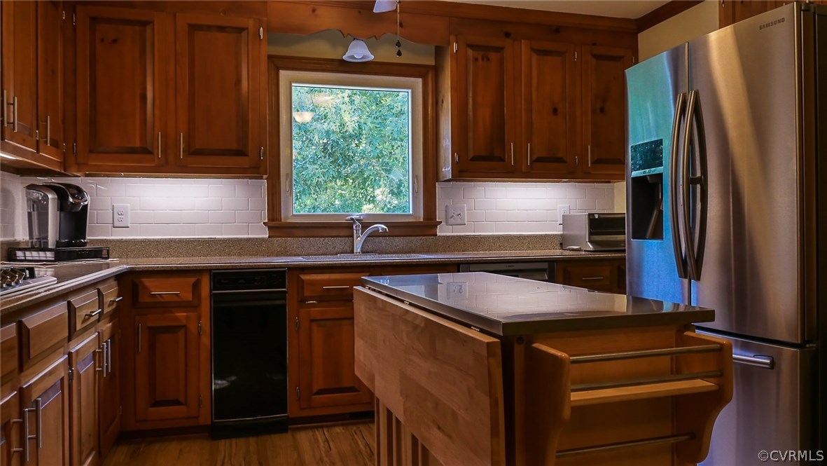13000 River Road Chesterfield, VA 23838 - Photo 12 of 50 a kitchen with a sink stove and refrigerator