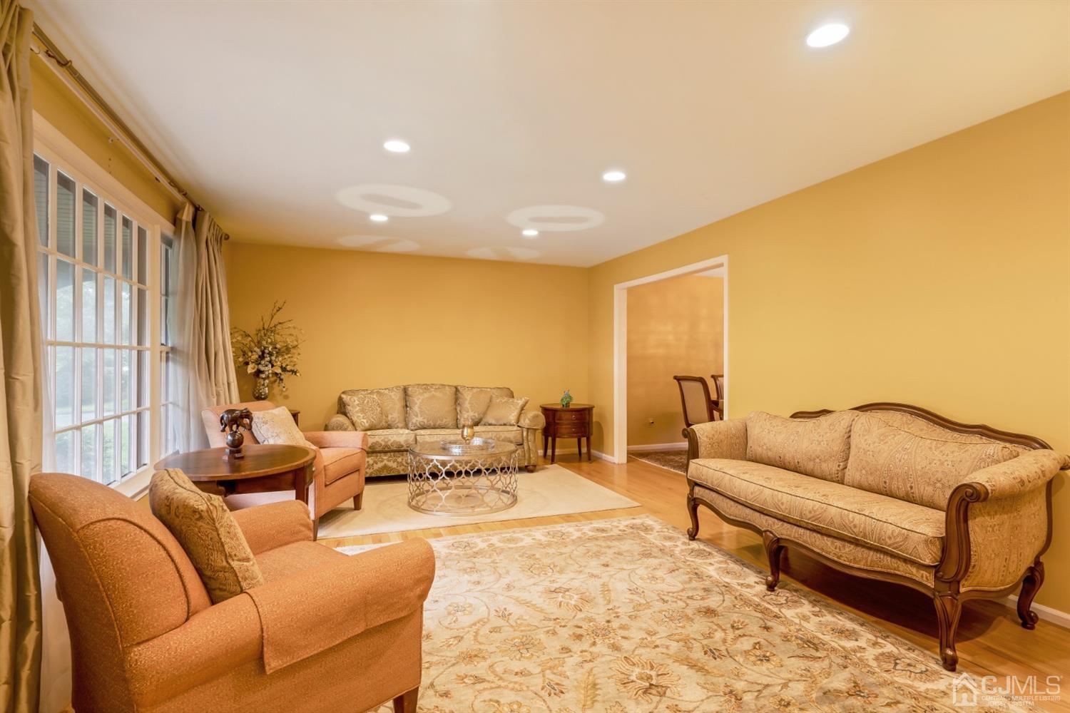 6 Fox Hill Road Edison, NJ 08820 - Photo 3 of 26 a living room with furniture and a large window