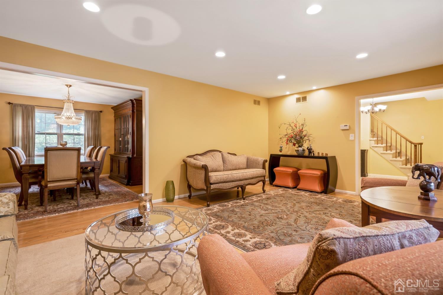 6 Fox Hill Road Edison, NJ 08820 - Photo 4 of 26 a living room with furniture and a couch