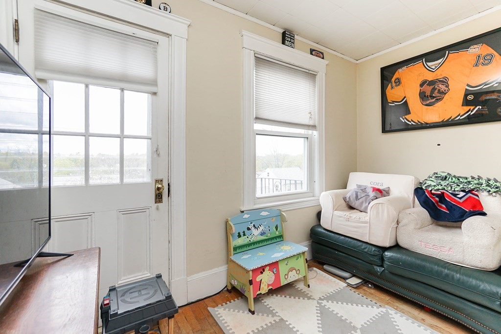 45 Redlands Road Boston, MA 02132 - Photo 32 of 41 a living room with furniture and next to a window