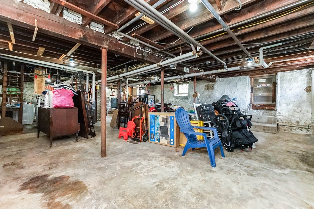 45 Redlands Road Boston, MA 02132 - Photo 39 of 41 a view of a storage room with a lot of stuff