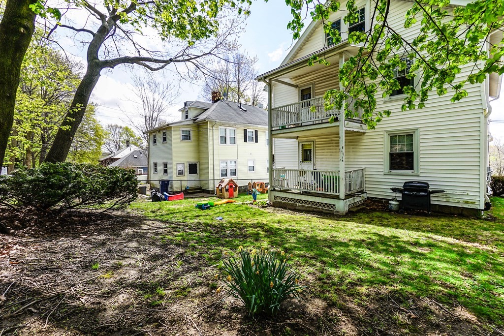 45 Redlands Road Boston, MA 02132 - Photo 40 of 41 a view of a house with backyard