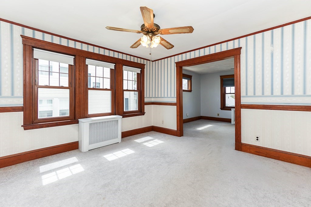 45 Redlands Road Boston, MA 02132 - Photo 8 of 41 a view of an empty room with a window