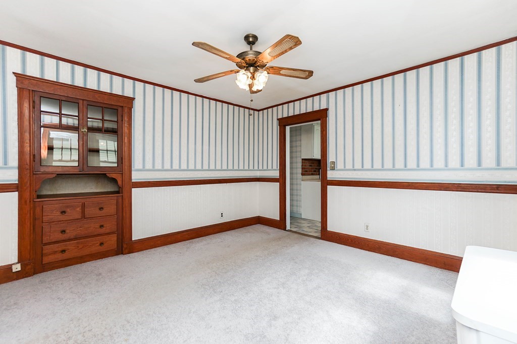 45 Redlands Road Boston, MA 02132 - Photo 9 of 41 a view of an empty room with a window