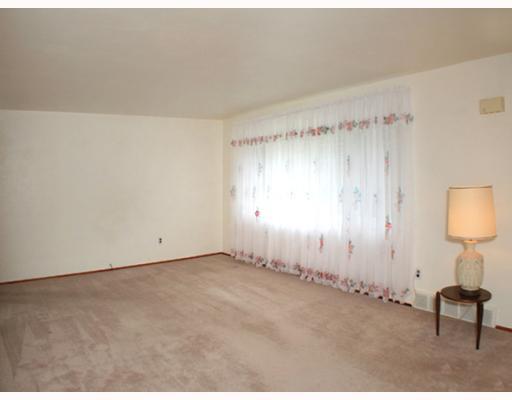 5262 Curry Road Baldwin, PA 15236 - Photo 3 of 14 Living Room. Large living room with large window for open feeling and plenty of natural sunlight.