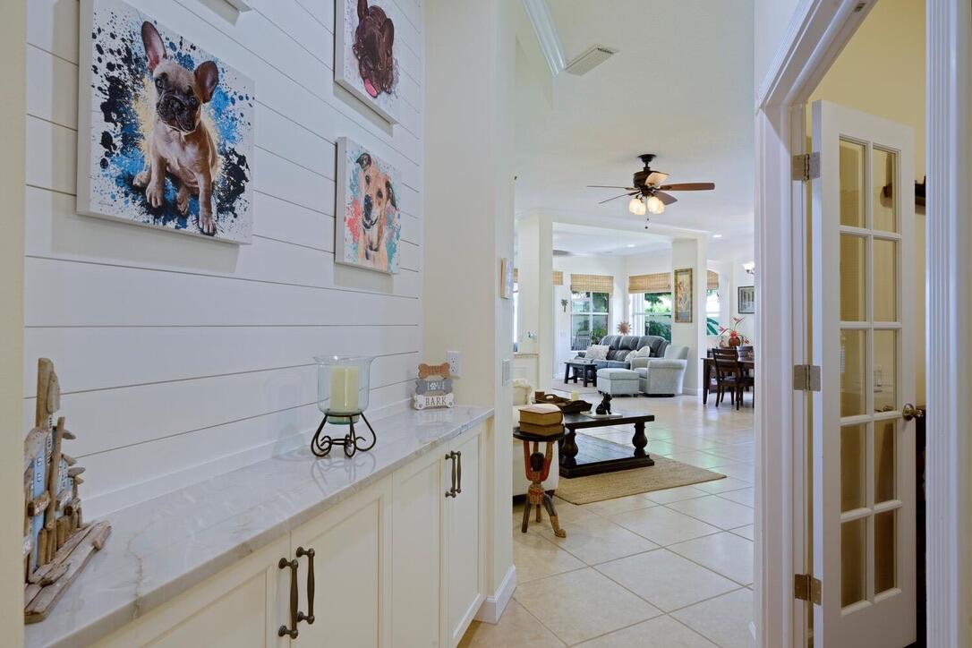 174 Hampton Circle Jupiter, FL 33458 - Photo 28 of 45 a view of a hallway with workspace and a window