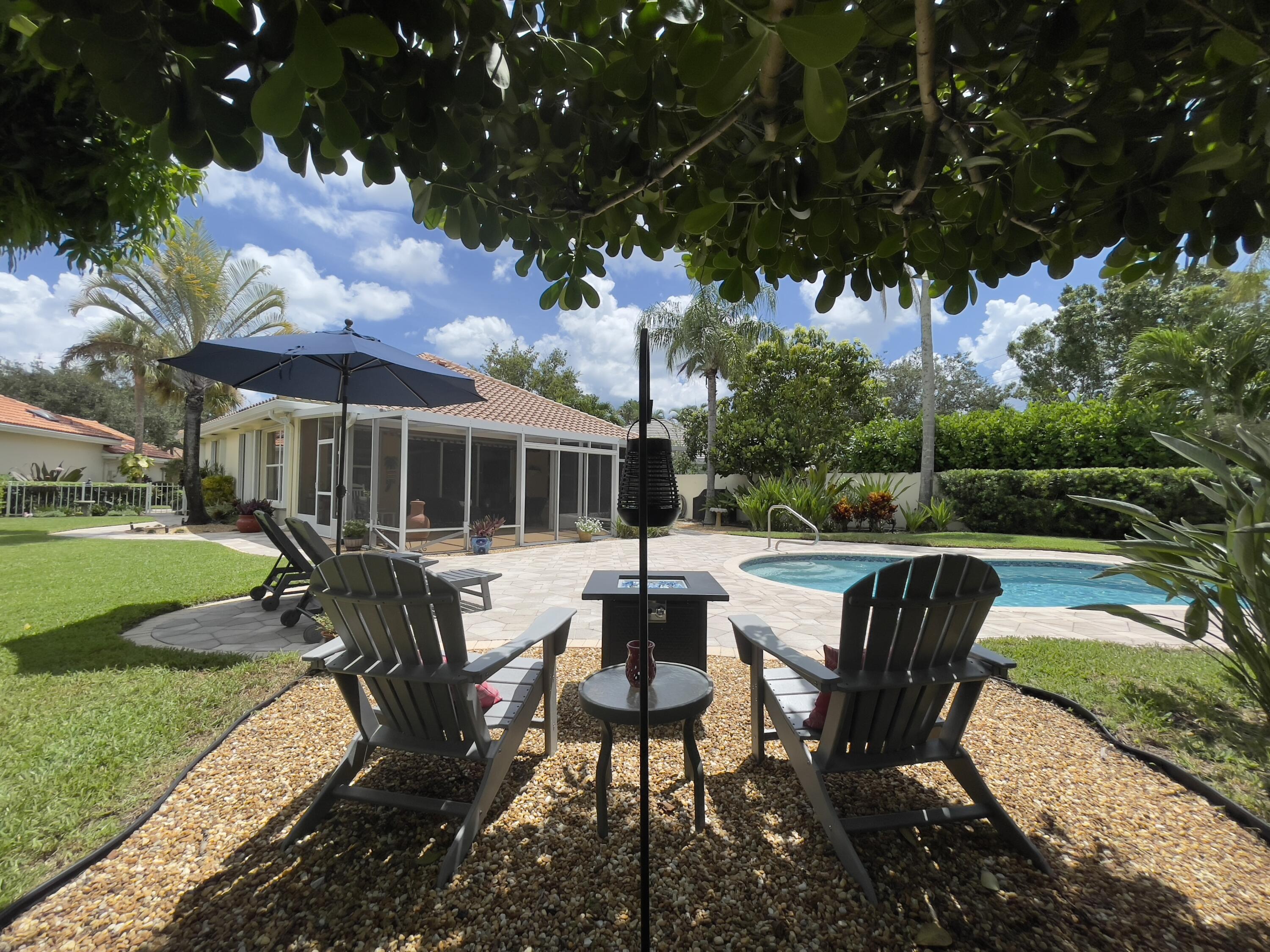 174 Hampton Circle Jupiter, FL 33458 - Photo 36 of 45 a view of a patio in backyard