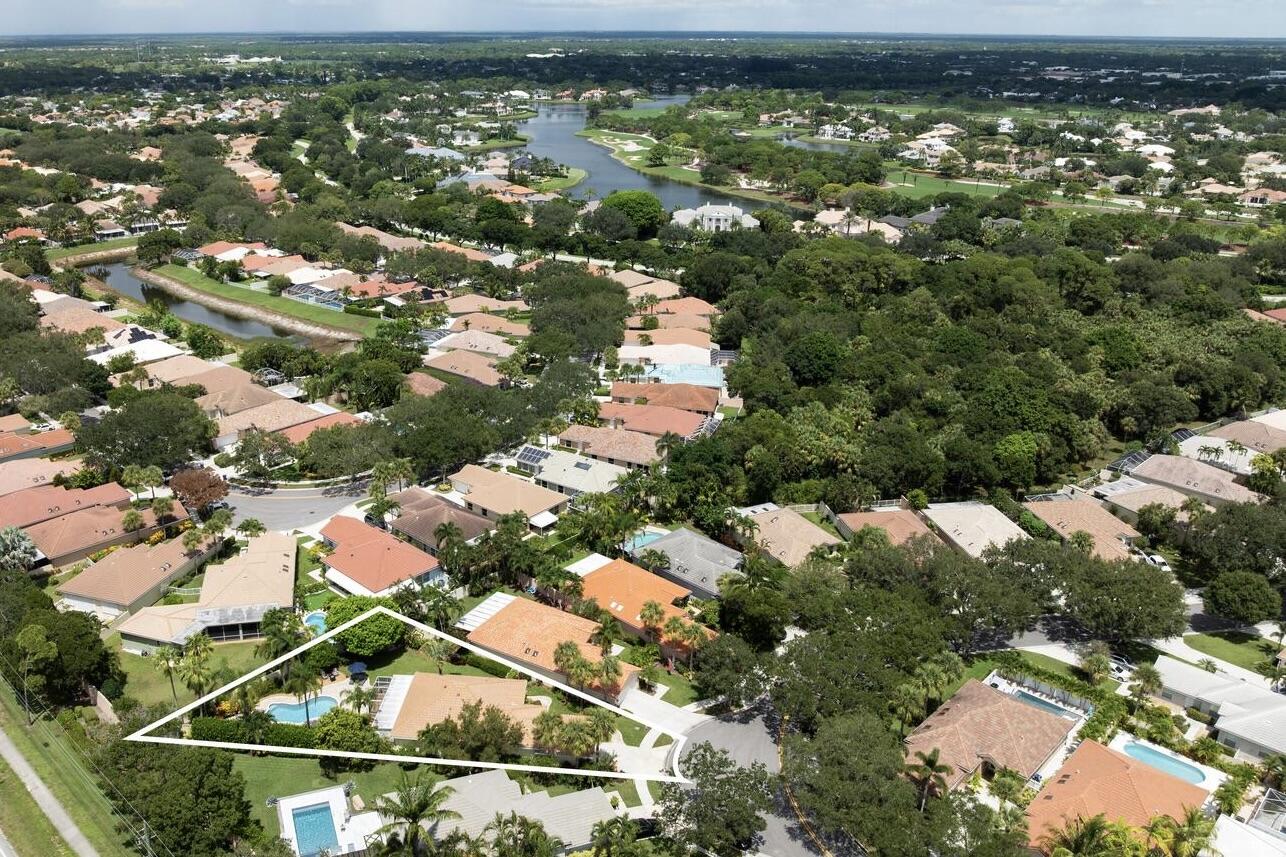 174 Hampton Circle Jupiter, FL 33458 - Photo 42 of 45 an aerial view of residential houses with outdoor space