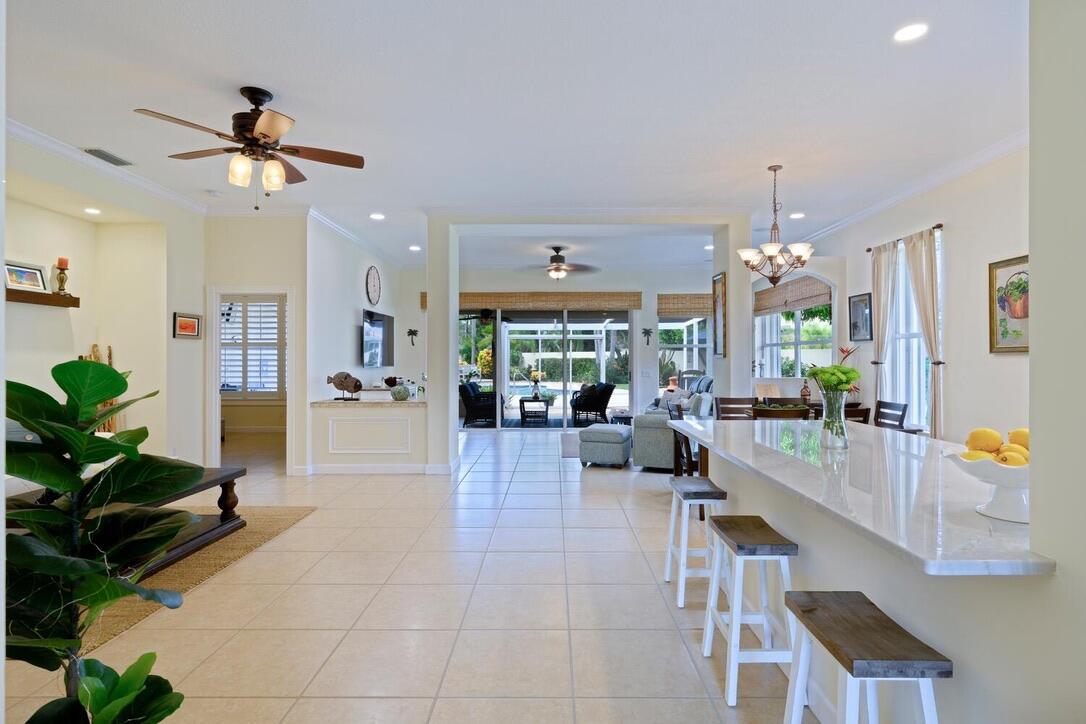 174 Hampton Circle Jupiter, FL 33458 - Photo 7 of 45 a view of a living room and kitchen