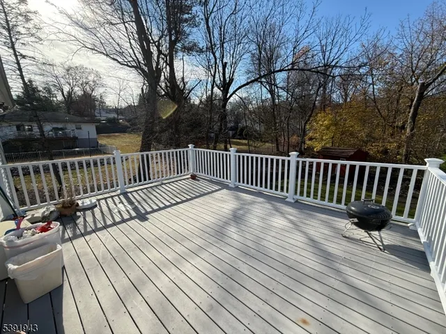 a view of a house with a back yard