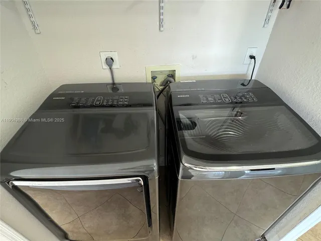 a utility room with water heater