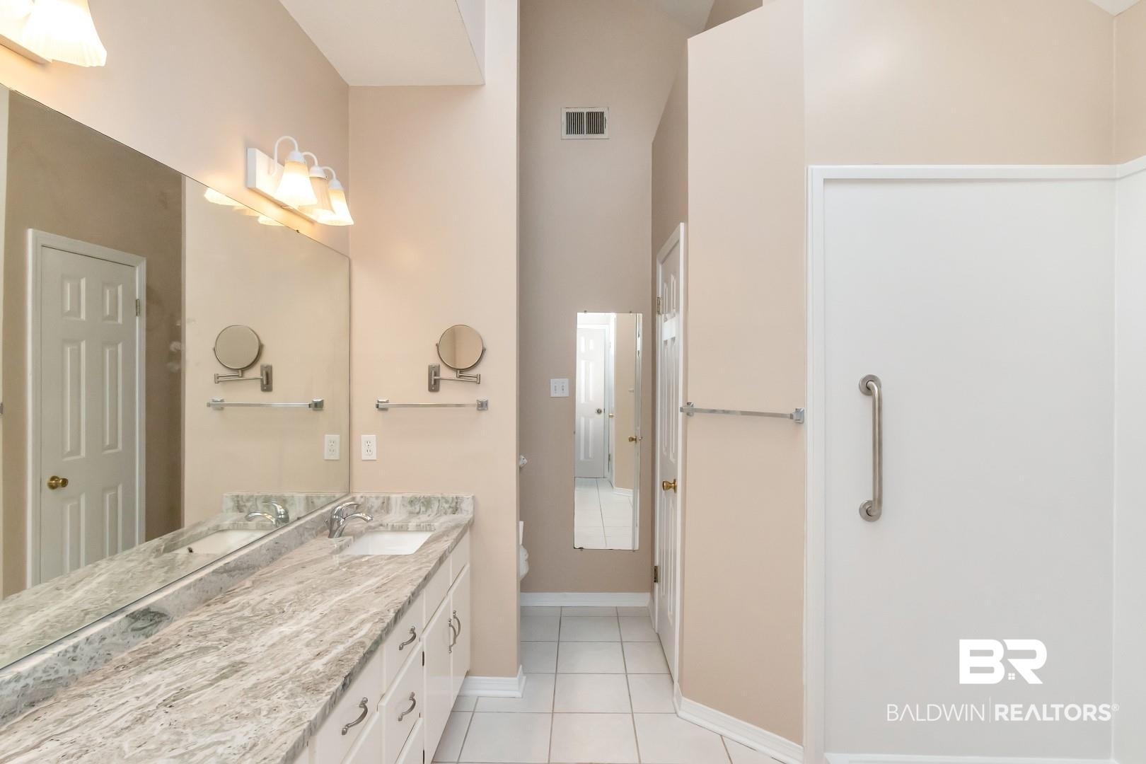 6117 Lennox Place Mobile, AL 36693 - Photo 28 of 39 Full bath with visible vents, tile patterned flooring, vanity, baseboards, and toilet